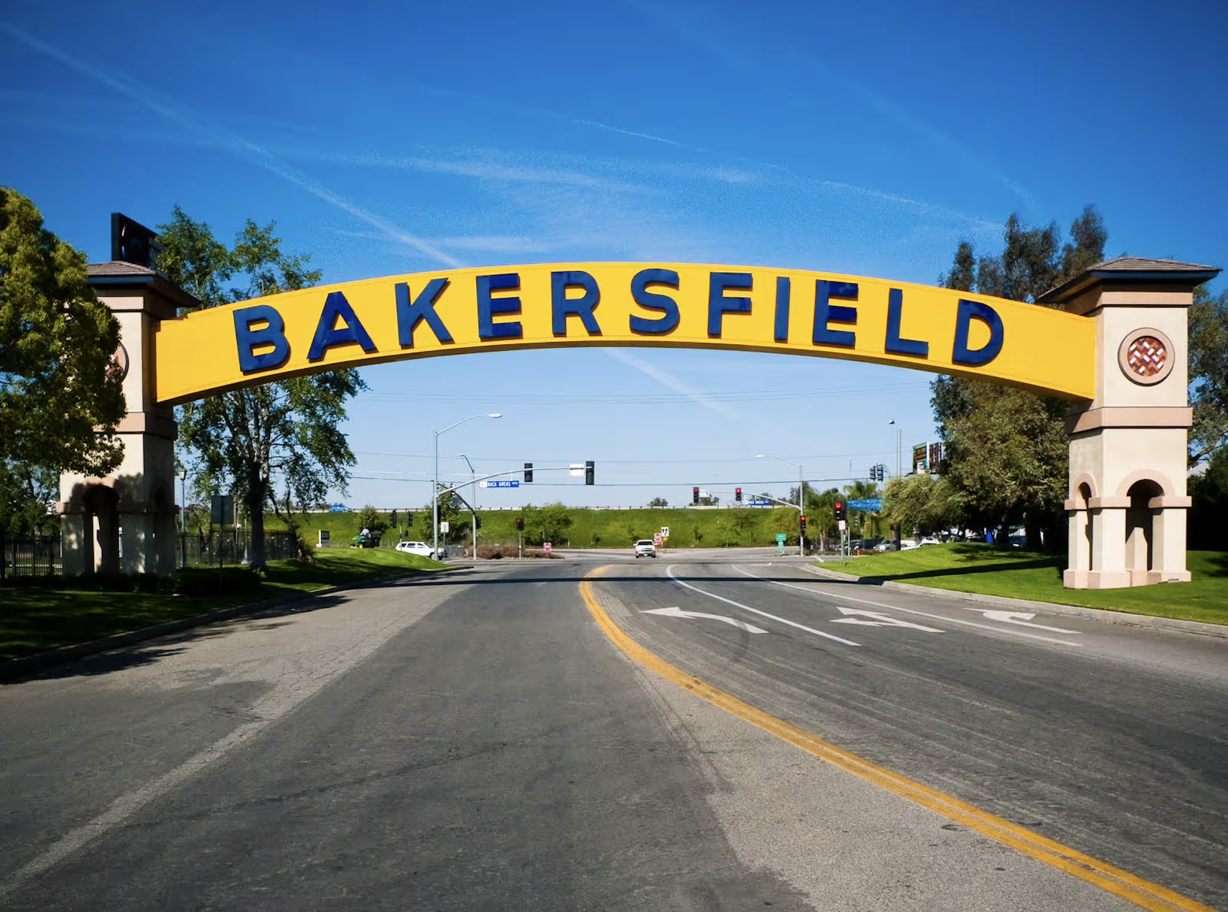 Bakersfield California city entrance sign over roadway at local intersection